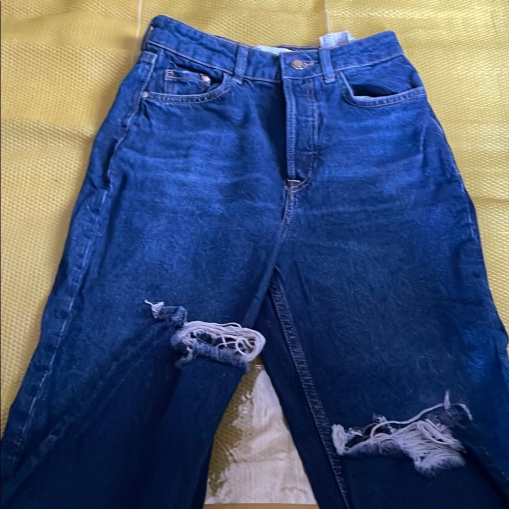 Distressed Blue Jeans
